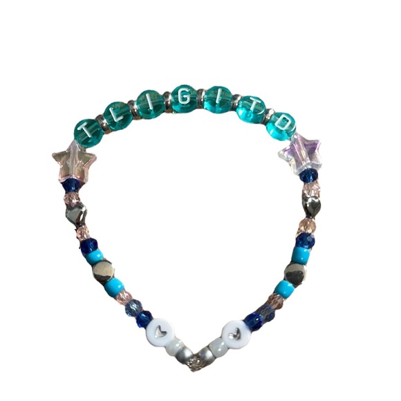 5 for $20 Taylor Swift Bracelet
“This Love Is Glowing In The Dark” (This Love) - Picture 2 of 2